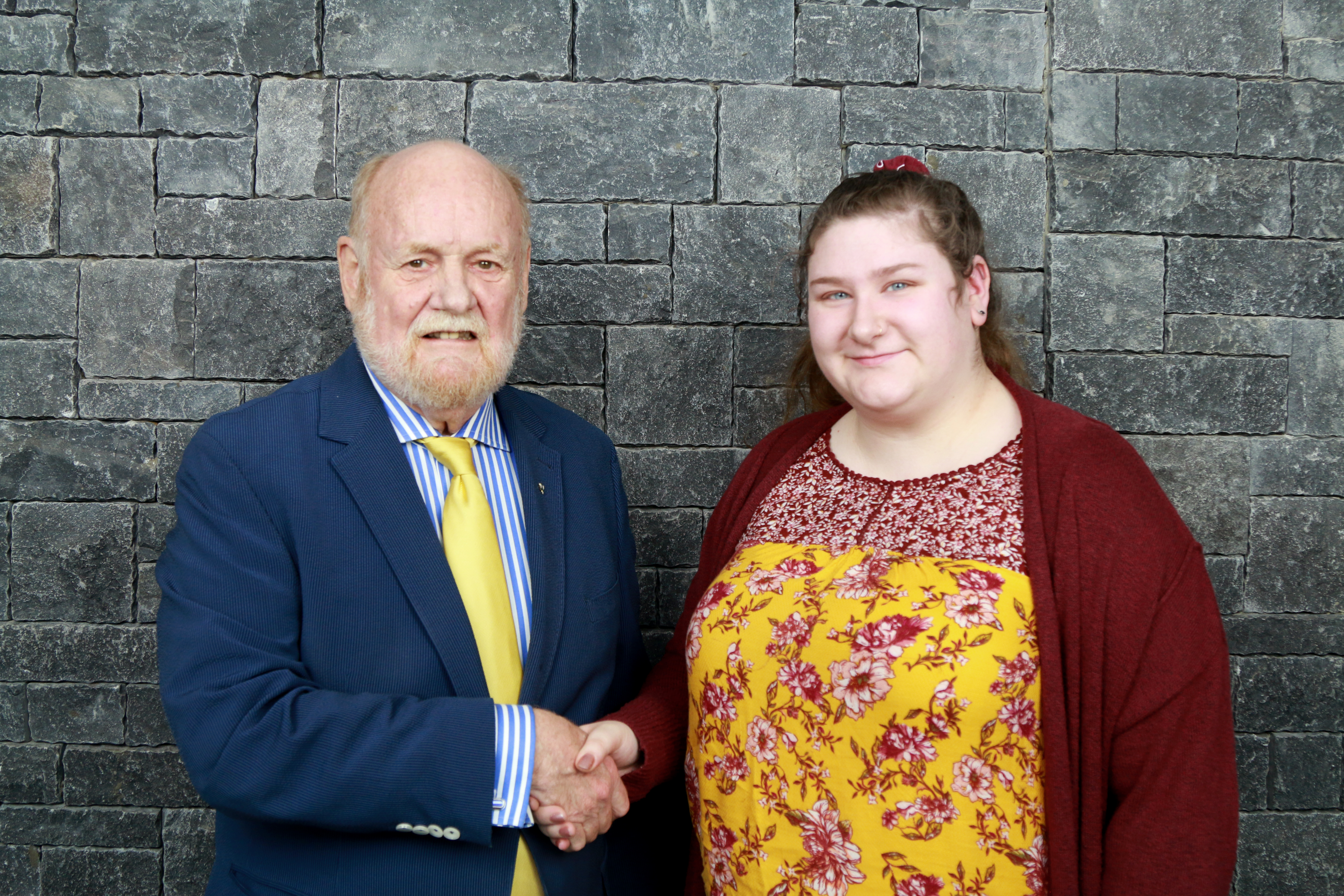 Accepting the President's Excellence Award from Dr. Ron Common at Sault College on March 3rd, 2020.